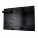 Black pegboard wall organizer with various hooks on a white background