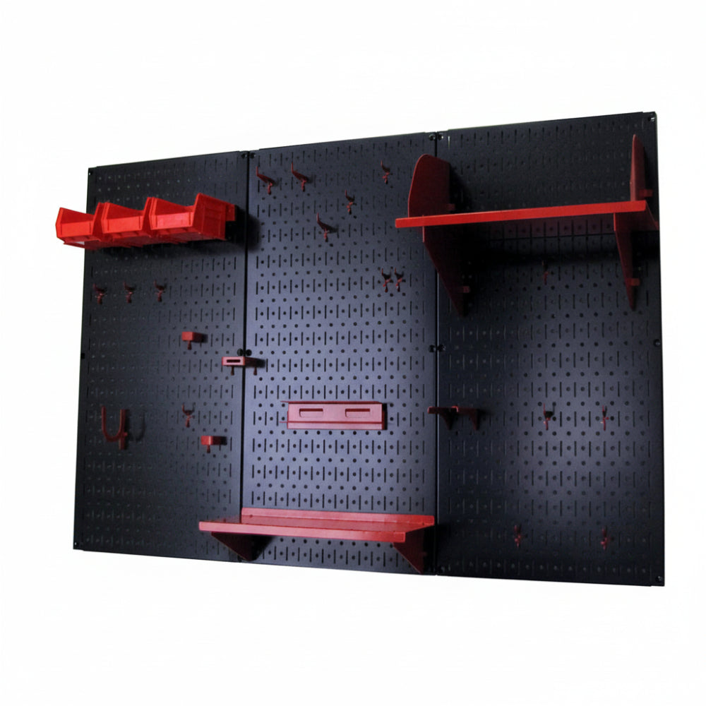 Black pegboard wall organizer with red shelves and hooks on a white background