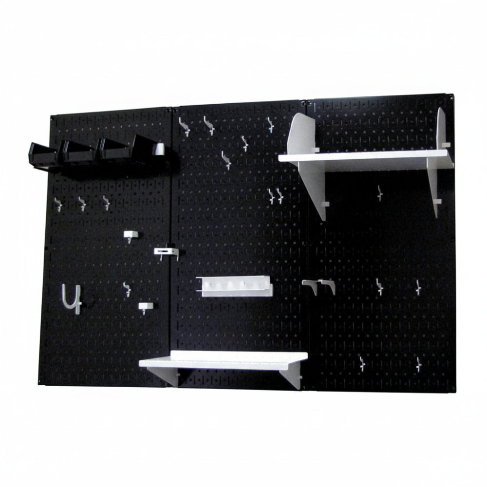 Black pegboard with white shelves and hooks on a white background