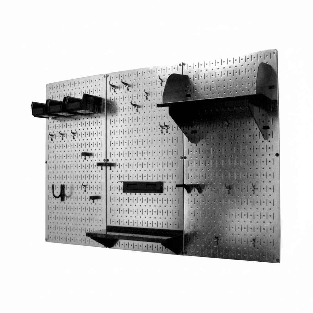 Pegboard wall system with shelves and hooks on a white background