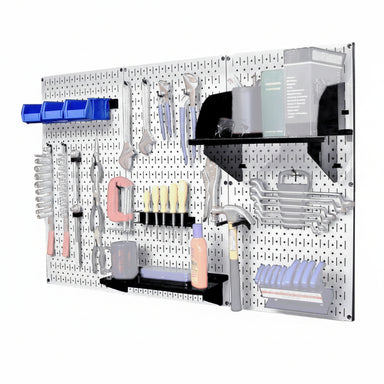 White Pegboard wall organizer with tools and storage bins on a white background