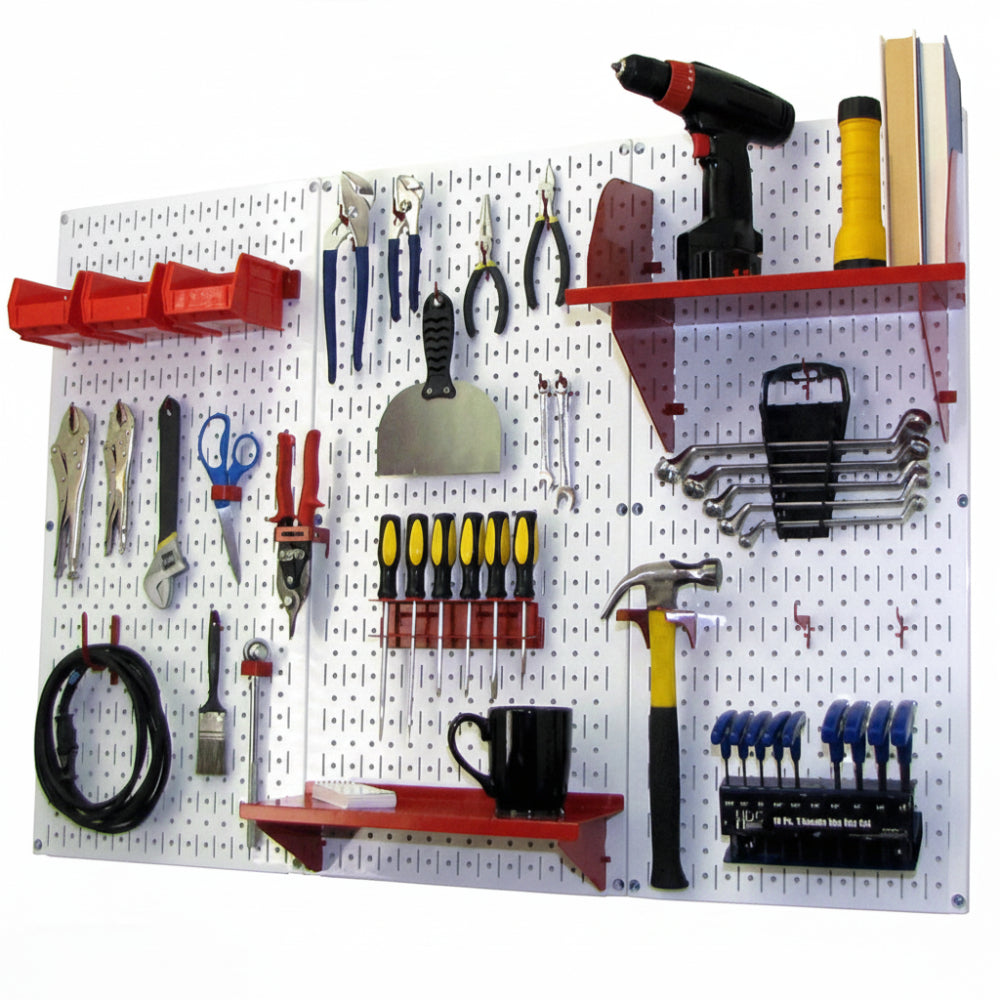 Wall-mounted tool organizer with various tools on a white pegboard