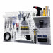 White Pegboard wall organizer with tools and supplies on a white background
