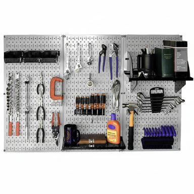 Wall-mounted tool organizer with various tools and supplies on a pegboard.