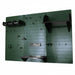 Green pegboard wall system with shelves and hooks on a white background