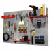Wall-mounted tool organizer with various tools on a gray pegboard