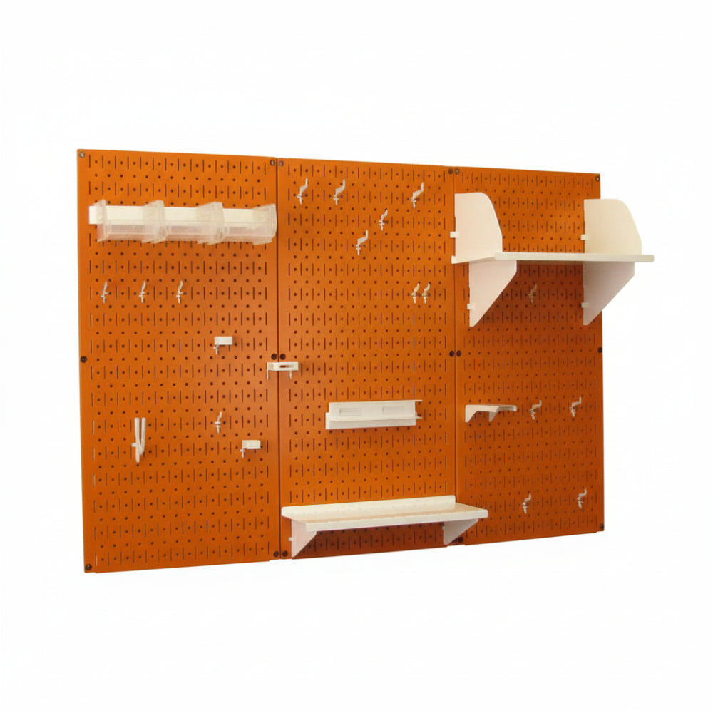 Orange pegboard wall system with shelves and hooks on a white background