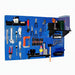 Wall-mounted tool organizer with various tools on a blue pegboard background