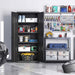 Garage storage system with cabinets and shelves filled with tools and supplies.
