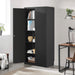 Black storage cabinet with open door in a room with a desk and chair.