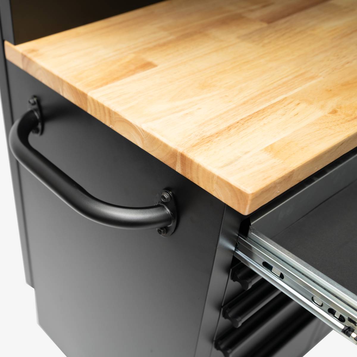 Workbench with wooden top and metal drawers