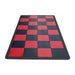 Checkered red and black mat on a white background