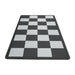 Checkered black and white mat on a white background