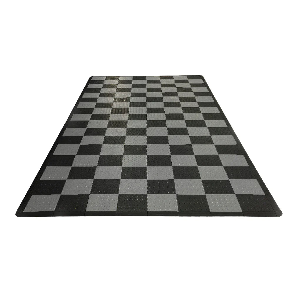 Checkered black and gray rug on a white background