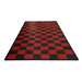 Red and black checkered mat on a white background