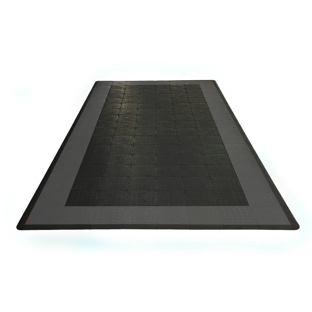 Black rectangular mat with textured surface on a white background