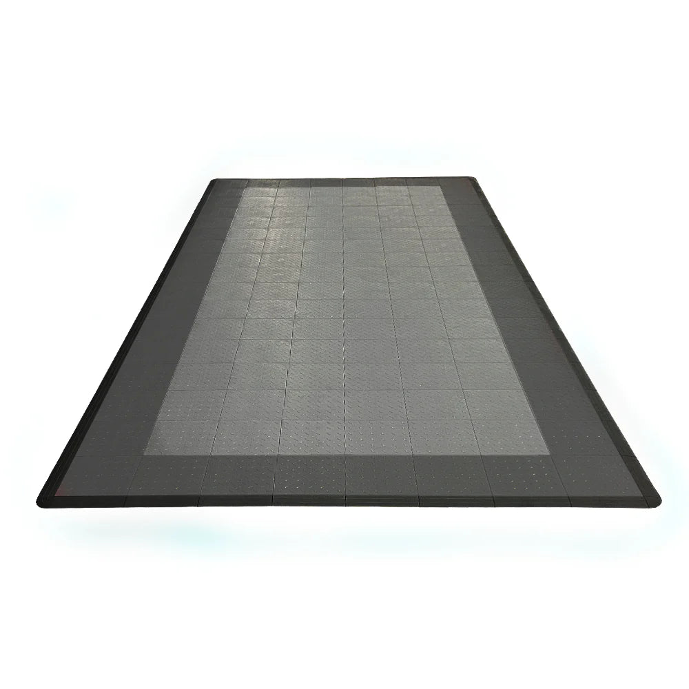 Black and gray grid-patterned mat on a white background
