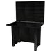 Black workbench with black pegboards against a white background
