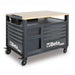 Tool cart with multiple drawers and a wooden top on wheels, featuring the Beta brand.