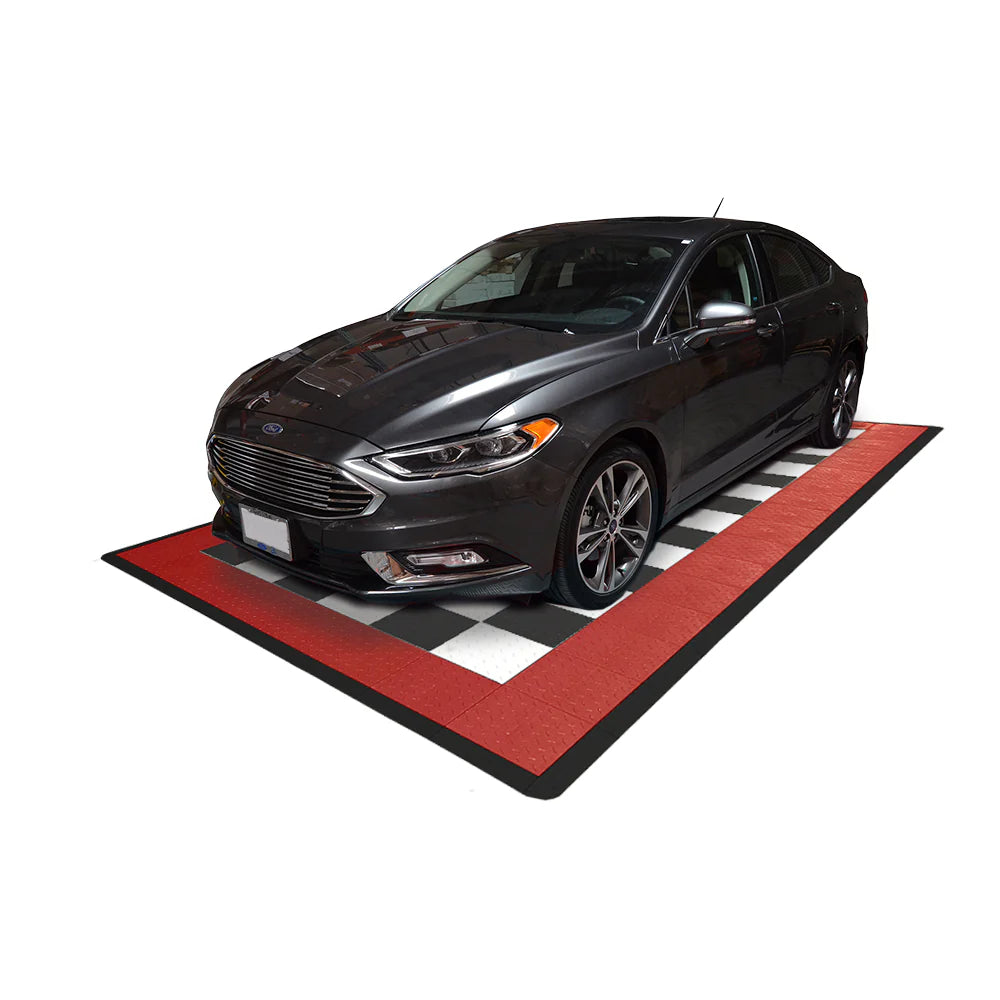 Black car on a red and black checkered floor mat