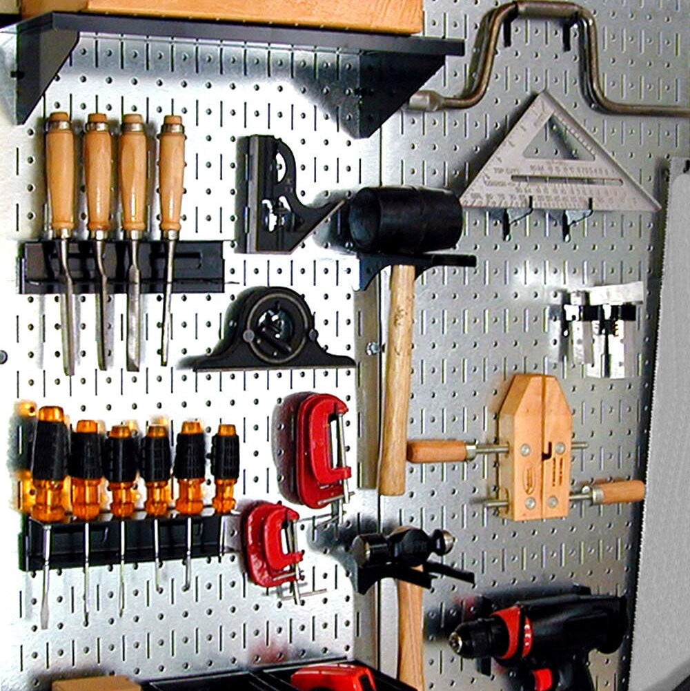 Organized garage wall with tools on a steel pegboard