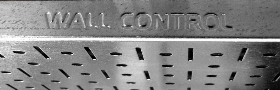 Metal wall control with 'WALL CONTROL' engraving
