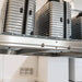 Auxx-Lift Motorized Garage Ceiling Storage Lift close up with luggage