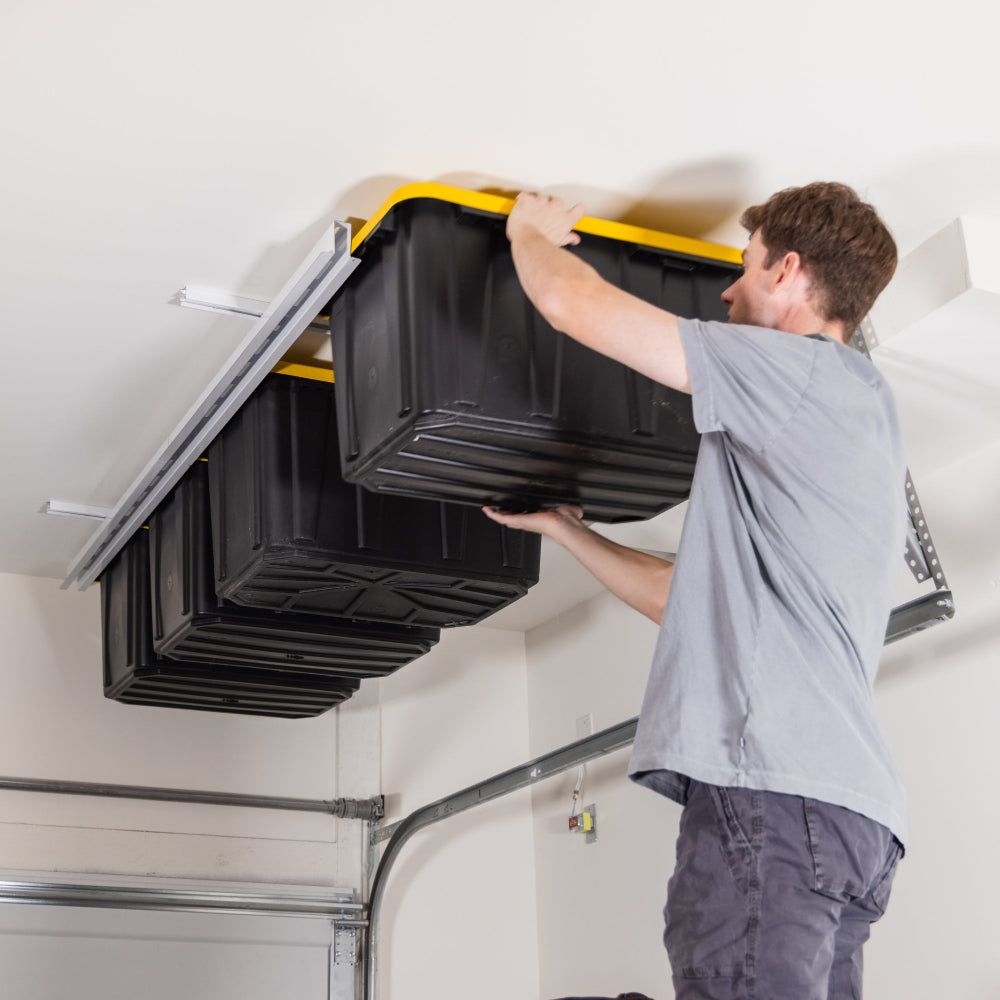 ceiling-sam-tote-slide-man-installing-totes