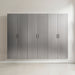 Set of five gray storage cabinets with black handles on a white wall.