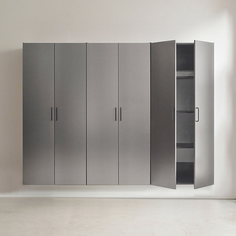 Gray wardrobe with one door open on a light background