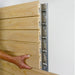 storeWALL InstallStrip panel being put on
