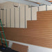 storeWALL InstallStrip being installed in garage on large wall