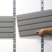 storeWALL Installstrip installation on white wall